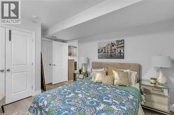 Light wood-finish flooring with white baseboards - 