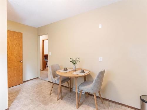 Eat-in kitchen area virtually staged - 129 St Michael Road, Winnipeg, MB - Indoor Photo Showing Dining Room