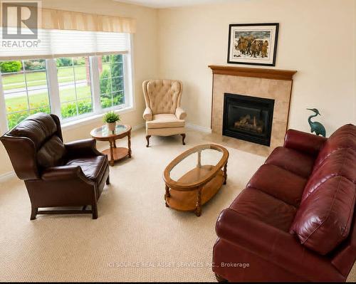 6 Edgewater Drive, Brighton, ON - Indoor Photo Showing Living Room With Fireplace