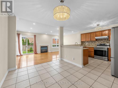 3186 Cabano Crescent, Mississauga, ON - Indoor Photo Showing Kitchen With Fireplace