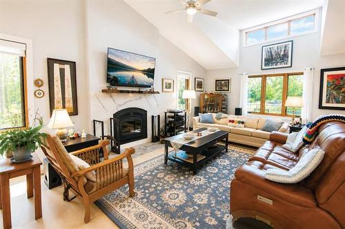 2 Lisgar Pl, Pinawa, MB - Indoor Photo Showing Living Room With Fireplace