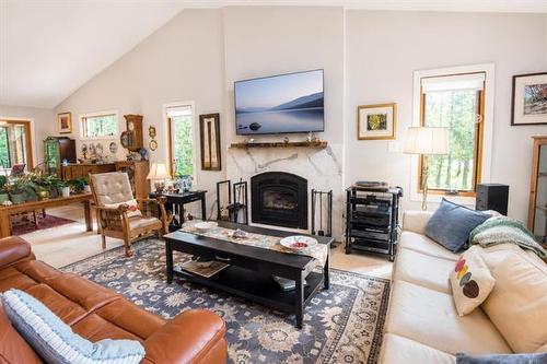 2 Lisgar Pl, Pinawa, MB - Indoor Photo Showing Living Room With Fireplace