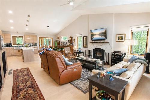 2 Lisgar Pl, Pinawa, MB - Indoor Photo Showing Living Room With Fireplace