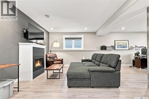 635 Redwood Crescent, Warman, SK - Indoor Photo Showing Living Room With Fireplace