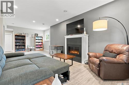 635 Redwood Crescent, Warman, SK - Indoor Photo Showing Living Room With Fireplace