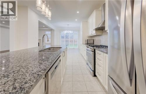 Kitchen featuring granite countertops, stainless steel appliances, white cabinetry, and recessed lighting - 52 Pointer Street, Cambridge, ON - Indoor Photo Showing Kitchen With Double Sink With Upgraded Kitchen