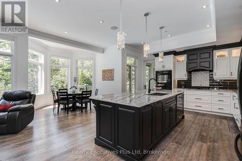 Kitchen Island & Breakfast Nook - 27 Kingfisher Crescent, Tiny, ON - Indoor Photo Showing Kitchen With Double Sink With Upgraded Kitchen