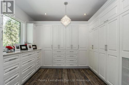 Primary Bedroom Walk In Closet - 27 Kingfisher Crescent, Tiny, ON - Indoor Photo Showing Other Room