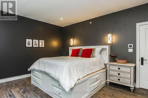 Bedroom 2 with Walk In Closet - 27 Kingfisher Crescent, Tiny, ON - Indoor Photo Showing Bedroom