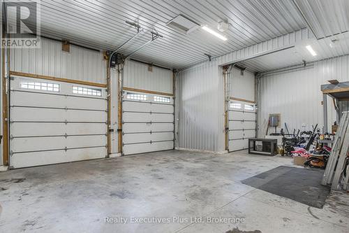 Garage Area - 27 Kingfisher Crescent, Tiny, ON - Indoor Photo Showing Garage
