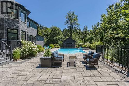 Pool Patio - 27 Kingfisher Crescent, Tiny, ON - Outdoor With In Ground Pool With Deck Patio Veranda