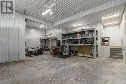 Garage Area - 27 Kingfisher Crescent, Tiny, ON - Indoor Photo Showing Garage
