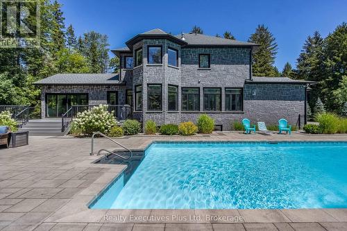 Pool - 27 Kingfisher Crescent, Tiny, ON - Outdoor With In Ground Pool With Deck Patio Veranda