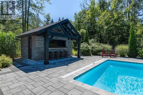 Pool House with 2PC Powder Room - 27 Kingfisher Crescent, Tiny, ON - Outdoor With In Ground Pool