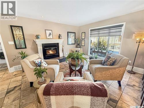 5 Poplar Place, Candle Lake, SK - Indoor Photo Showing Living Room With Fireplace
