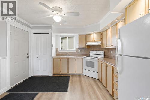 157 4Th Street W, Pierceland, SK - Indoor Photo Showing Kitchen With Double Sink