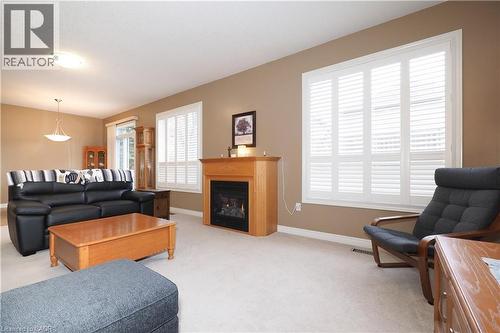 565 Springwater Drive, Waterloo, ON - Indoor Photo Showing Living Room With Fireplace