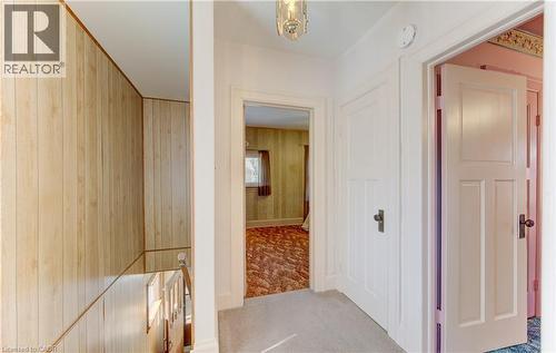 Second-story hallway with white paneled doors - 224 Weber Street E, Kitchener, ON - Indoor Photo Showing Other Room