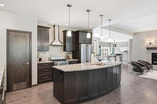 6975 Roblin Blvd, Headingley, MB - Indoor Photo Showing Kitchen With Upgraded Kitchen