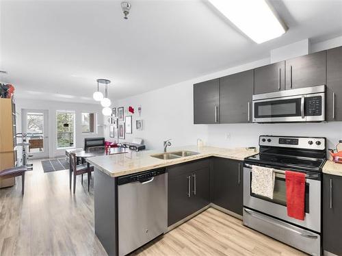 310-155 Sherbrook St, Winnipeg, MB - Indoor Photo Showing Kitchen With Stainless Steel Kitchen With Double Sink