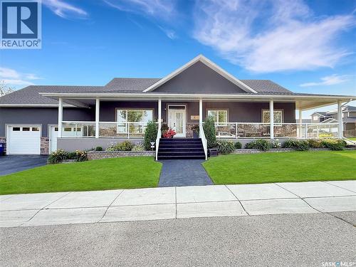 702 Cooper Drive, Swift Current, SK - Outdoor With Deck Patio Veranda With Facade