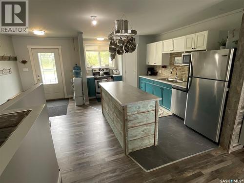 3829 First Point Beach Drive, Wakaw Lake, SK - Indoor Photo Showing Kitchen With Double Sink
