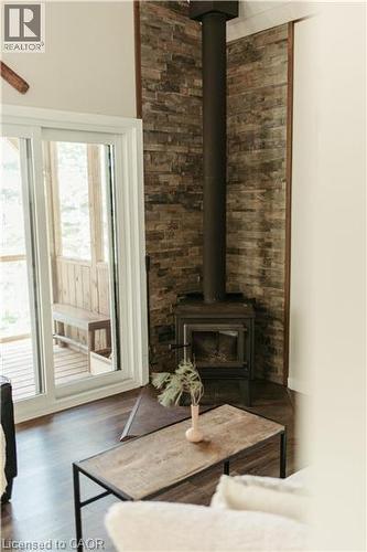 Wood Stove/Living Room - 3256 Machar Strong Boundary, Machar, ON - Indoor Photo Showing Other Room With Fireplace