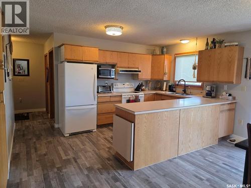 103 Bounty Street, Conquest, SK - Indoor Photo Showing Kitchen With Double Sink