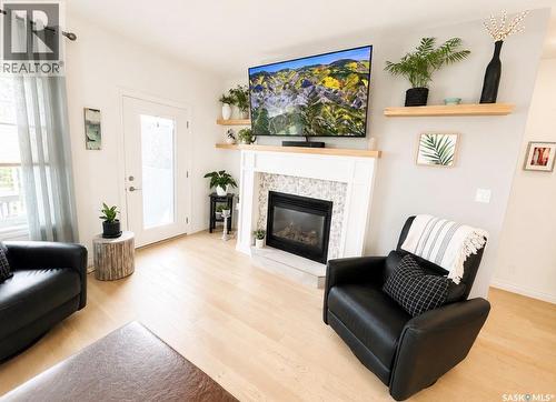 34 533 4Th Avenue Ne, Swift Current, SK - Indoor Photo Showing Living Room With Fireplace