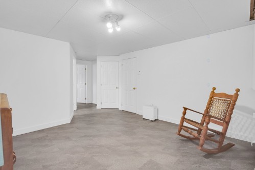 Salle familiale - 921 Rue Principale, Prévost, QC - Indoor Photo Showing Other Room