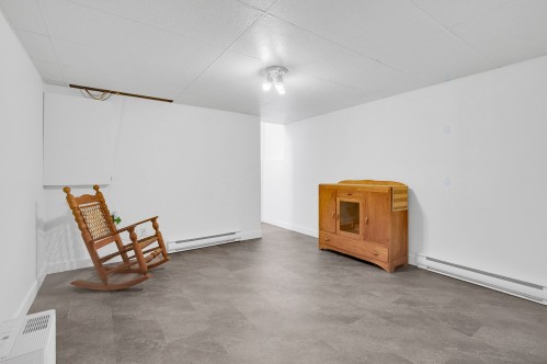 Salle familiale - 921 Rue Principale, Prévost, QC - Indoor Photo Showing Other Room