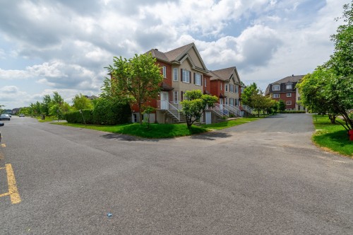 Rue - 6967 Rue Du Chardonneret, Brossard, QC - Outdoor