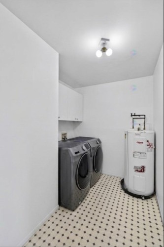 Salle de lavage - 6-666 Av. Ampère, Laval (Laval-Des-Rapides), QC - Indoor Photo Showing Laundry Room