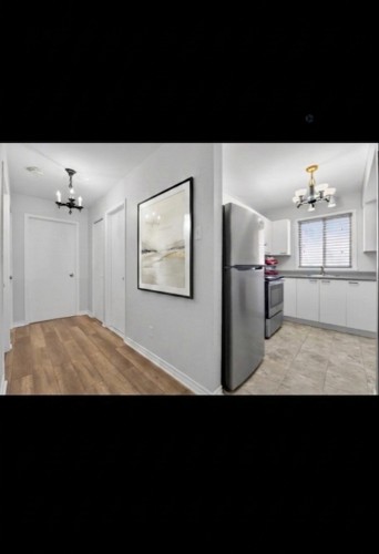 Hall d'entrée/Vestibule - 6-666 Av. Ampère, Laval (Laval-Des-Rapides), QC - Indoor