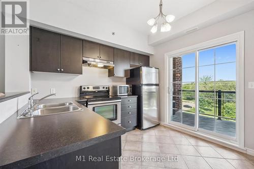412 - 308 WATSON PARKWAY N  Guelph (Grange Road), ON N1E 0G7