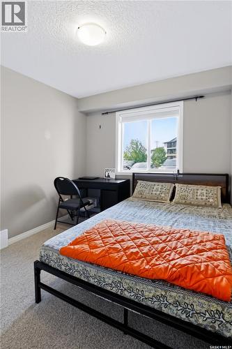 113 125 Willis Crescent, Saskatoon, SK - Indoor Photo Showing Bedroom