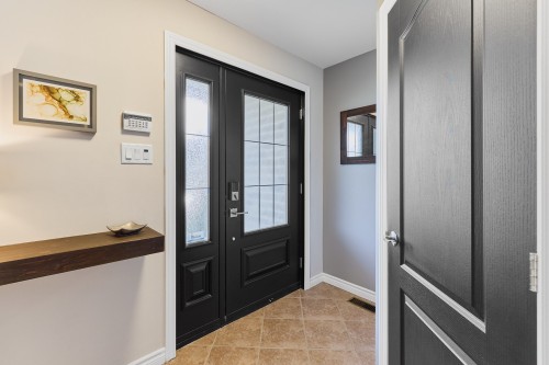Hall d'entrée/Vestibule - 21 Rue Des Catalpas, Saint-Philippe, QC - Indoor Photo Showing Other Room