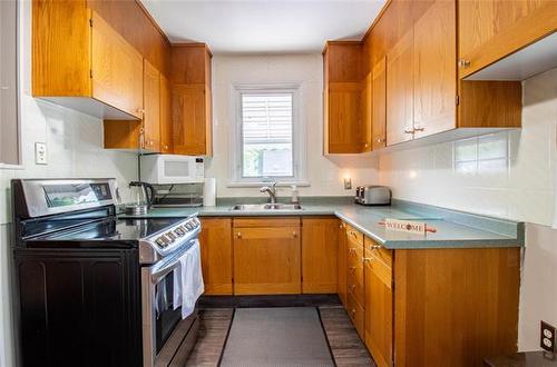 584 Centennial St, Winnipeg, MB - Indoor Photo Showing Kitchen With Double Sink