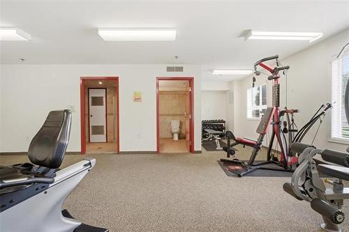 217-835 Adsum Dr, Winnipeg, MB - Indoor Photo Showing Gym Room
