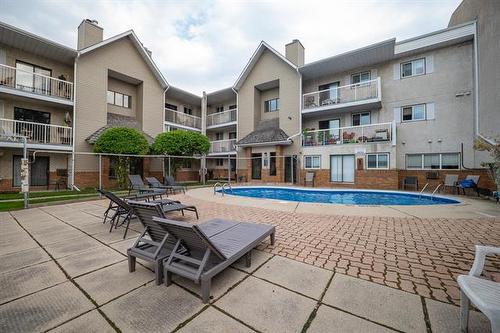 2307-100 Plaza Dr, Winnipeg, MB - Outdoor With In Ground Pool With Balcony