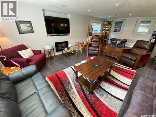 74 Madge Way, Yorkton, SK - Indoor Photo Showing Living Room With Fireplace