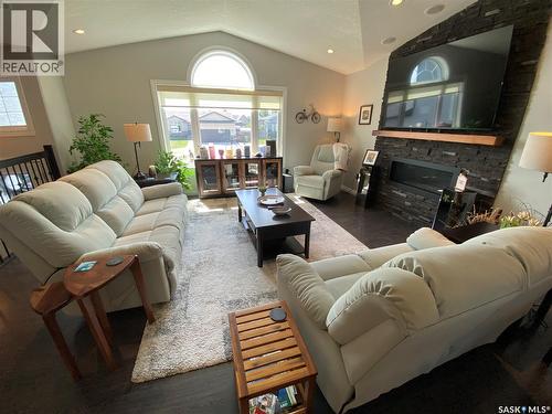 74 Madge Way, Yorkton, SK - Indoor Photo Showing Living Room With Fireplace
