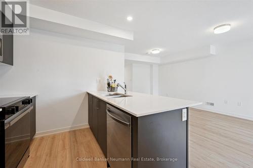 25 - 940 St David Street N, Centre Wellington (Fergus), ON - Indoor Photo Showing Kitchen With Double Sink