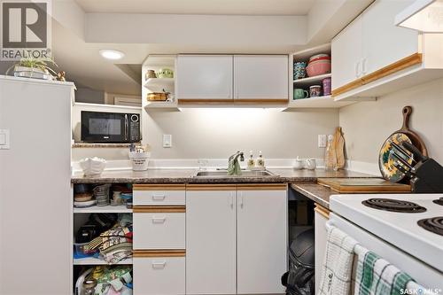 1021 12Th Street E, Saskatoon, SK - Indoor Photo Showing Kitchen With Double Sink
