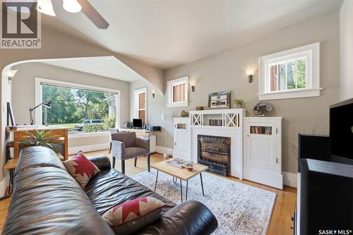 1021 12Th Street E, Saskatoon, SK - Indoor Photo Showing Living Room With Fireplace