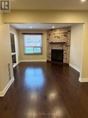 Main - 210 Ecclestone Drive, Brampton, ON - Indoor Photo Showing Living Room With Fireplace