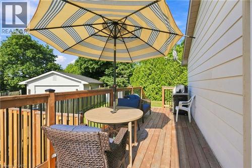 Wood-finish deck with a perimeter railing and outdoor dining area - 46 Brett Court, Hamilton, ON - Outdoor With Deck Patio Veranda With Exterior