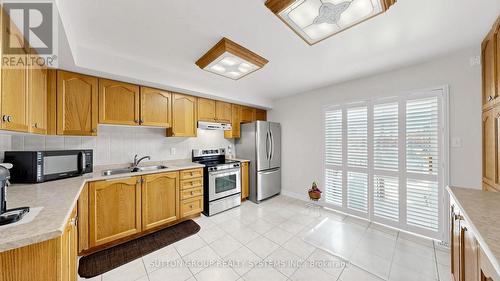 2138 Eglinton Avenue W, Toronto, ON - Indoor Photo Showing Kitchen With Double Sink