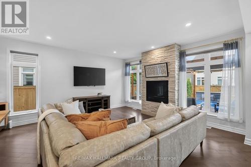 878 Excursion Way, Ottawa, ON - Indoor Photo Showing Living Room With Fireplace