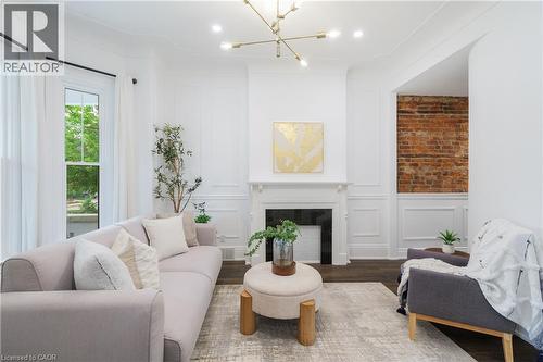 46 Murray Street E, Hamilton, ON - Indoor Photo Showing Living Room With Fireplace
